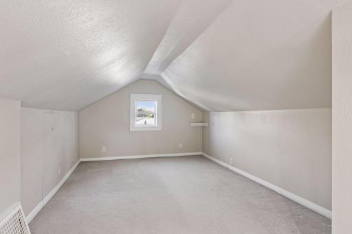 Upstairs, the entire level is thoughtfully dedicated to the private primary bedroom
