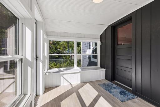 Lovely back porch area with new windows and flooring