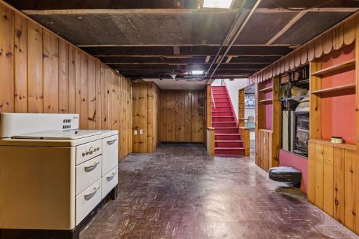 Head down to the lower level to discover a rec room, laundry, and storage space