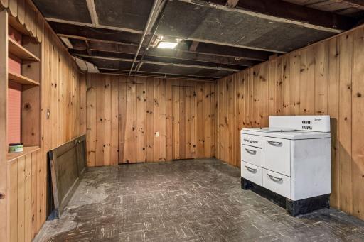 Head down to the lower level to discover a rec room, laundry, and storage space