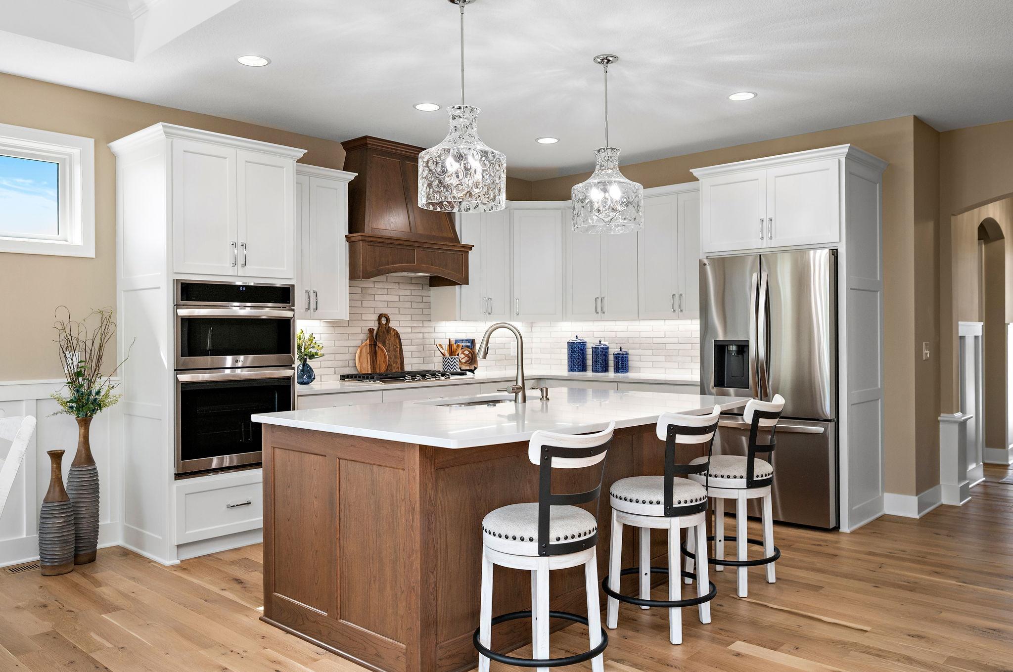 Kitchen- Beautiful quarts countertops and custom cabinets with soft close doors.