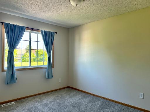 Bedroom 2 with new window treatment