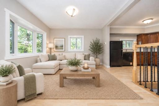 You walk in to this bright and beautiful living room - virtually staged