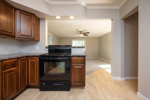 There is even a convenient breakfast bar between the kitchen and the dining room/family room space