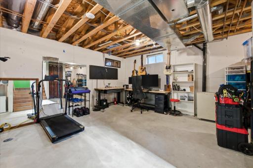 The lower-level has plenty of usable space for a home office, workout area, creative studio, hobby space, or additional storage.