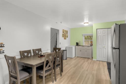 Informal dining space with back door entry w/ drop spot and coat cloest. Plenty of storage
