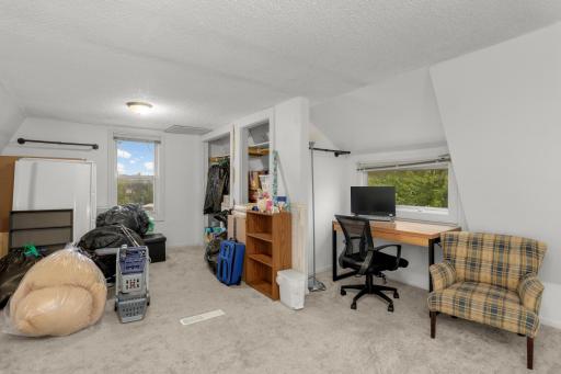 Upper-level bedroom w/ ample space to add a primary suite/2nd bath + office or sitting nook