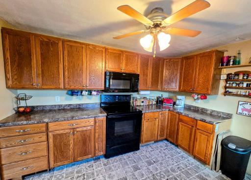 Kitchen has plenty of cabinet & countertop space