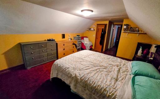 Primary bedroom-carpeted with 2 walk in closets