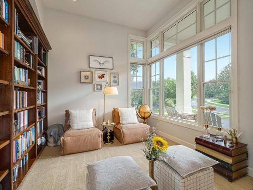 Den with large Transom windows