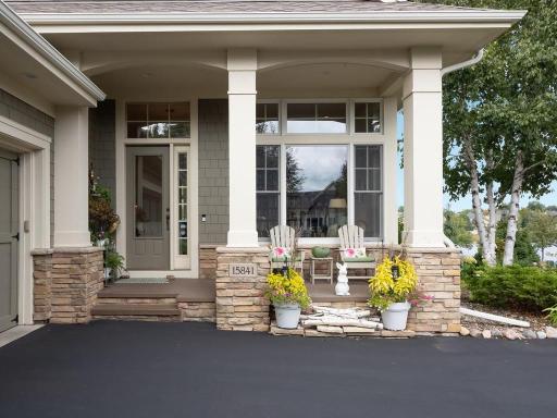 Front Porch with a Ledgestone Pillar base