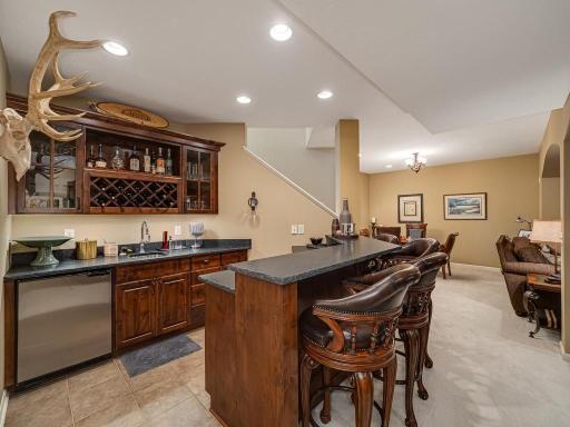 Lower level wet bar, Rough edge black granite countertops