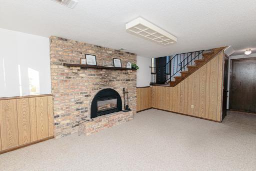 Lower level fireplace walkout room for additional office space