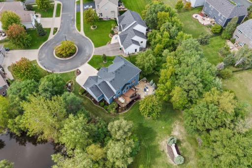 A peaceful pond adds another beautiful natural element to the backyard setting.