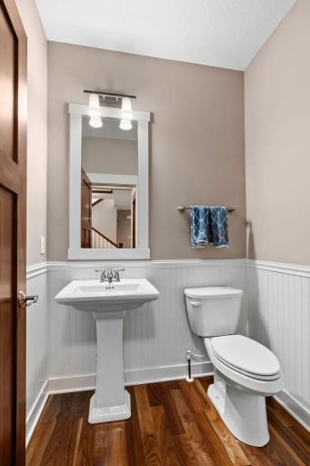 Conveniently located on the main level, this half bath continues the homeâs timeless finishes and thoughtful attention to detail.