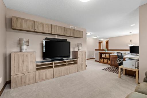 A built-in entertainment center adds function and storage to the loft, creating an easy second gathering space away from the main level.