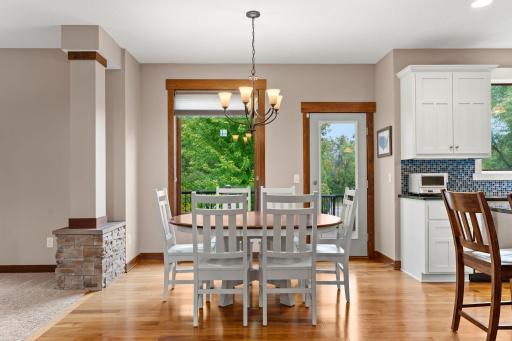 The dining area enjoys backyard views and direct deck accessâperfect for taking meals and gatherings outdoors.