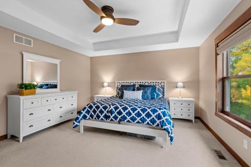 Generous proportions provide plenty of room for a full bedroom suite while maintaining a comfortable, open feel.