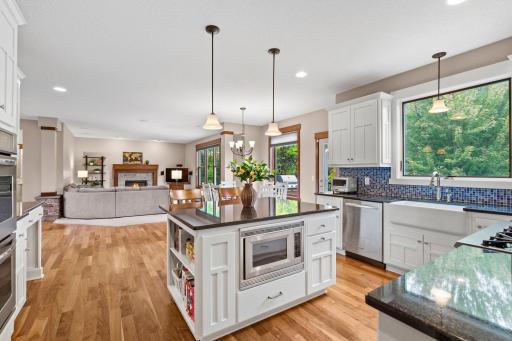 Thoughtfully designed with an expansive center island, abundant storage, and plenty of workspace for cooking, gathering, and entertaining.