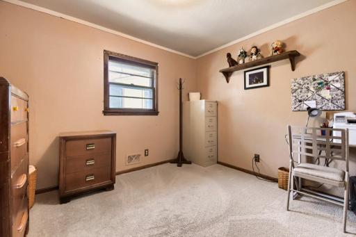 Third upper-level bedroom with brand-new carpeting and flexible space for a variety of needs.