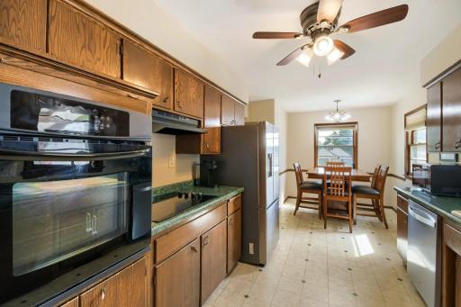 Functional kitchen layout with plenty of workspace and easy access to the dining area.