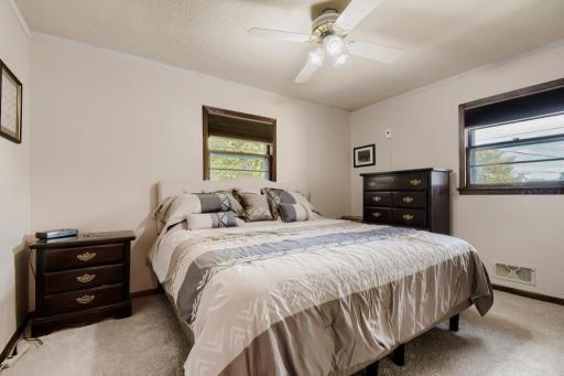 Spacious upper-level primary bedroom featuring brand-new carpeting and generous closet space.