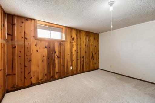 Private lower-level office or flex room with new carpetingâperfect for working from home, hobbies, or guests.