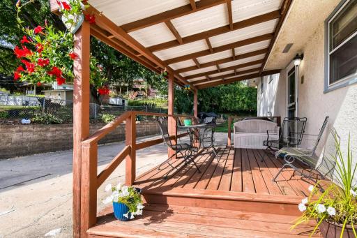 Relax or entertain on the inviting covered deck overlooking the backyard.