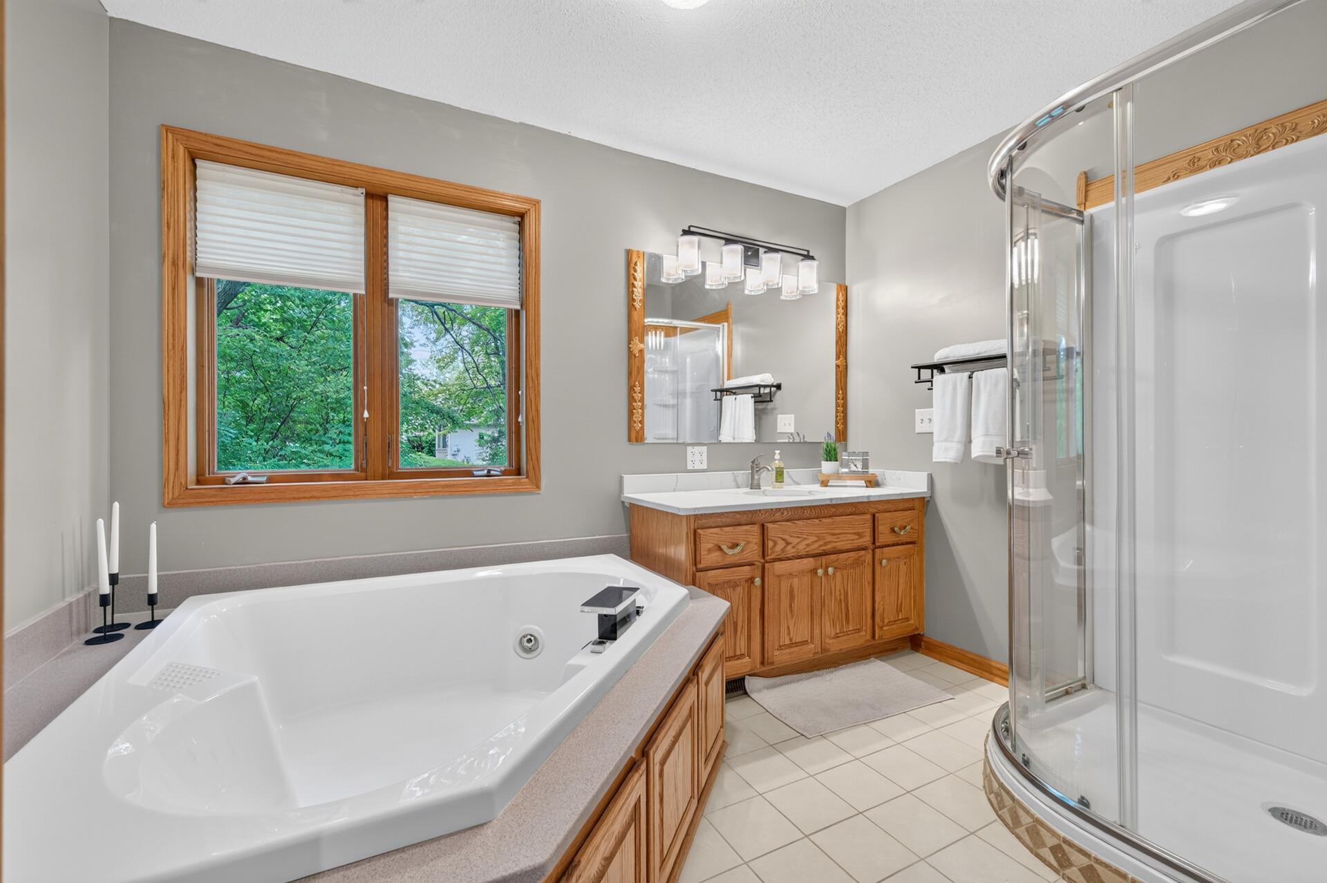 Full private primary bath with jetted tub.