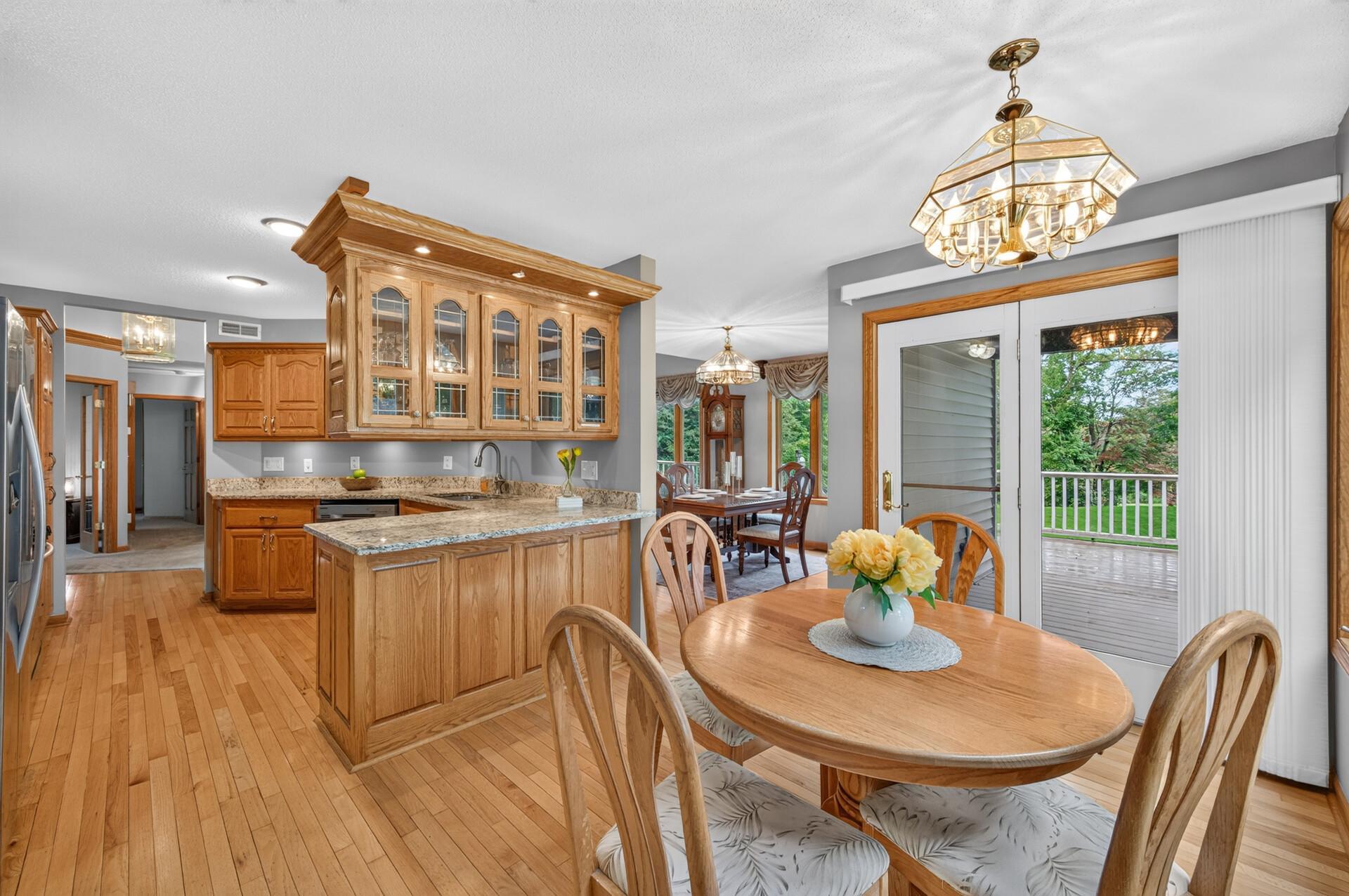 Informal dining to kitchen view.