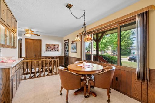 With a quiet view out the beautiful front window onto your front porch area.