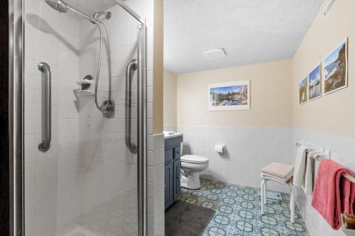 This lower level also features a (non-conforming) fourth bedroom, second bathroom, dedicated laundry room with a newer washer and dryer (2021), and abundant extra storage.