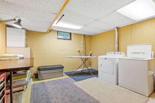 Essential mechanical updates include a brand-new water softener (2024) and water heater (2024).
