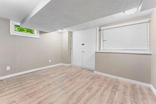 Lower level Bedroom with private Access. New flooring and freshly painted.