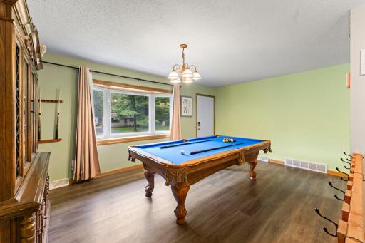 Main level dining room spacious and conveniently located next to the kitchen