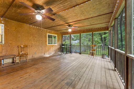 Screened in porch with ceiling fans, large and spacious, french doors to living room. Your own private sanctuary!