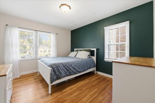 This is the large of the two bedrooms and has nice big windows that brings in an abundance of natural light.
