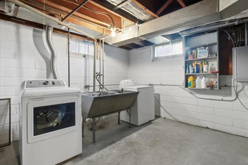Washer and dryer plus laundry tub all included in the sale.