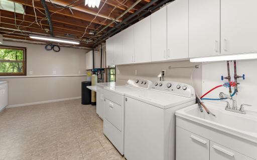 Larundry with New Laundry Tub & Cabinet