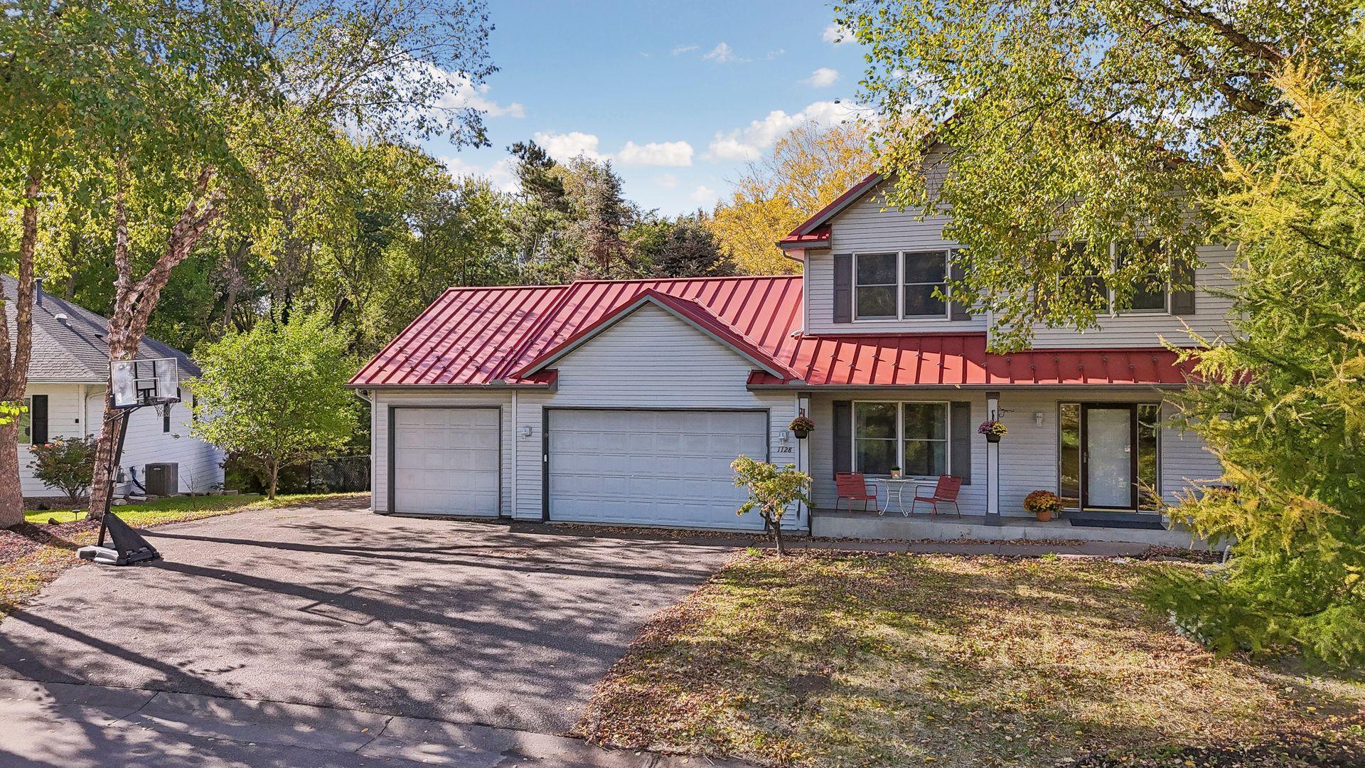 Beautiful curb appeal, a welcoming covered front porch, and a peaceful setting make this home truly special.