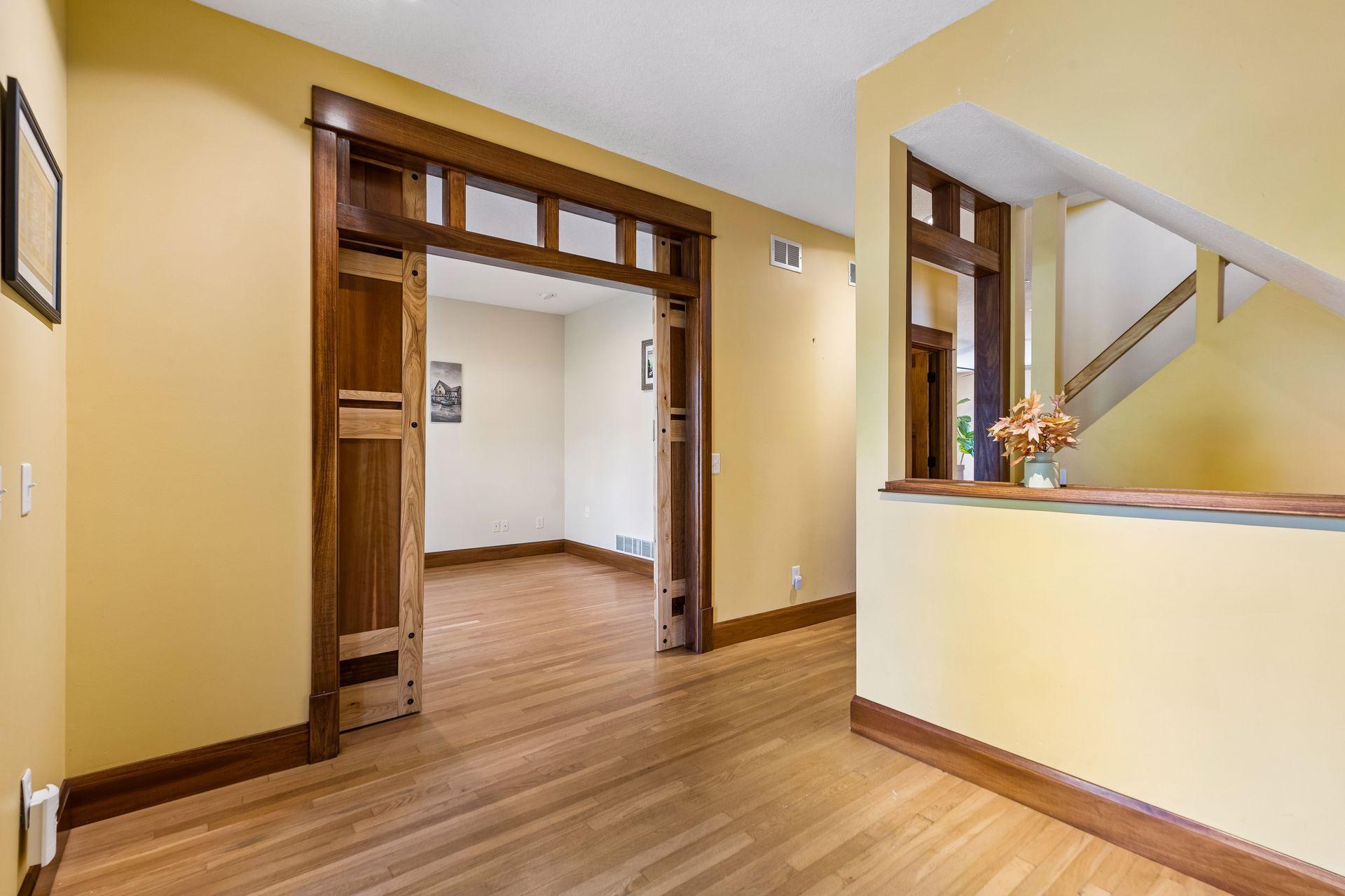 Just off the welcoming foyer, the front office offers a beautiful and convenient space to work from home.