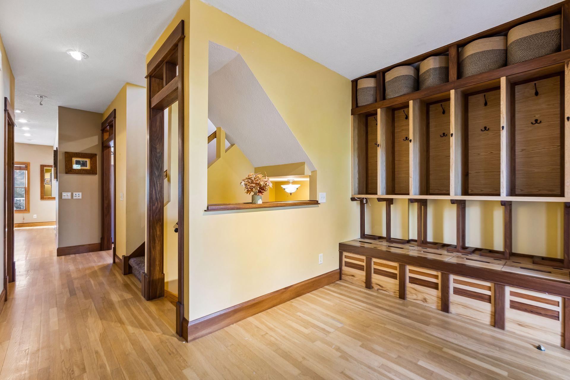Exceptional custom woodwork and gorgeous hardwood floors throughout the main and upper levels create a timeless, elevated feel.