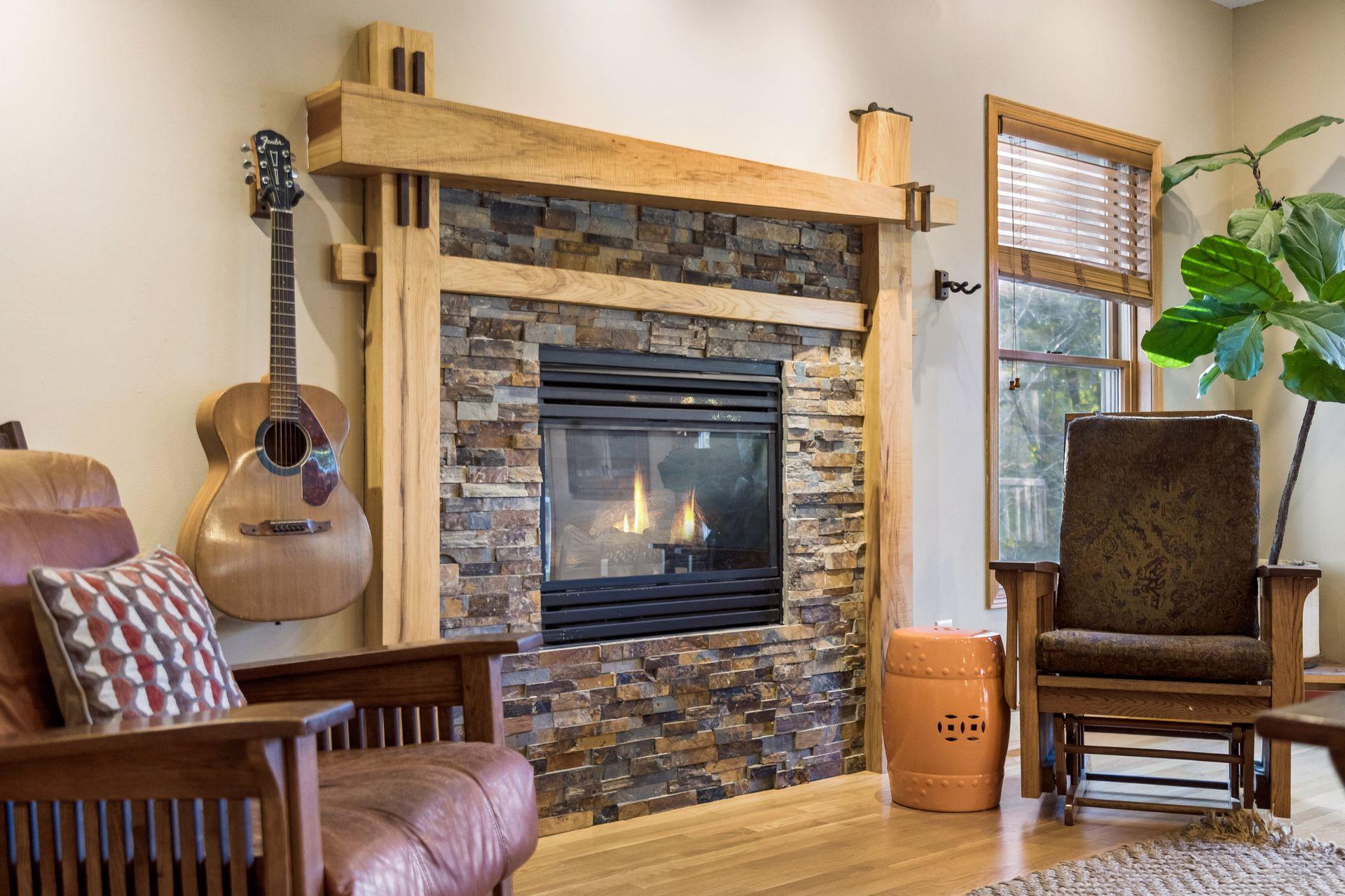 Take a closer look at the impressive fireplace detailing, showcasing the craftsmanship and character found throughout this home.