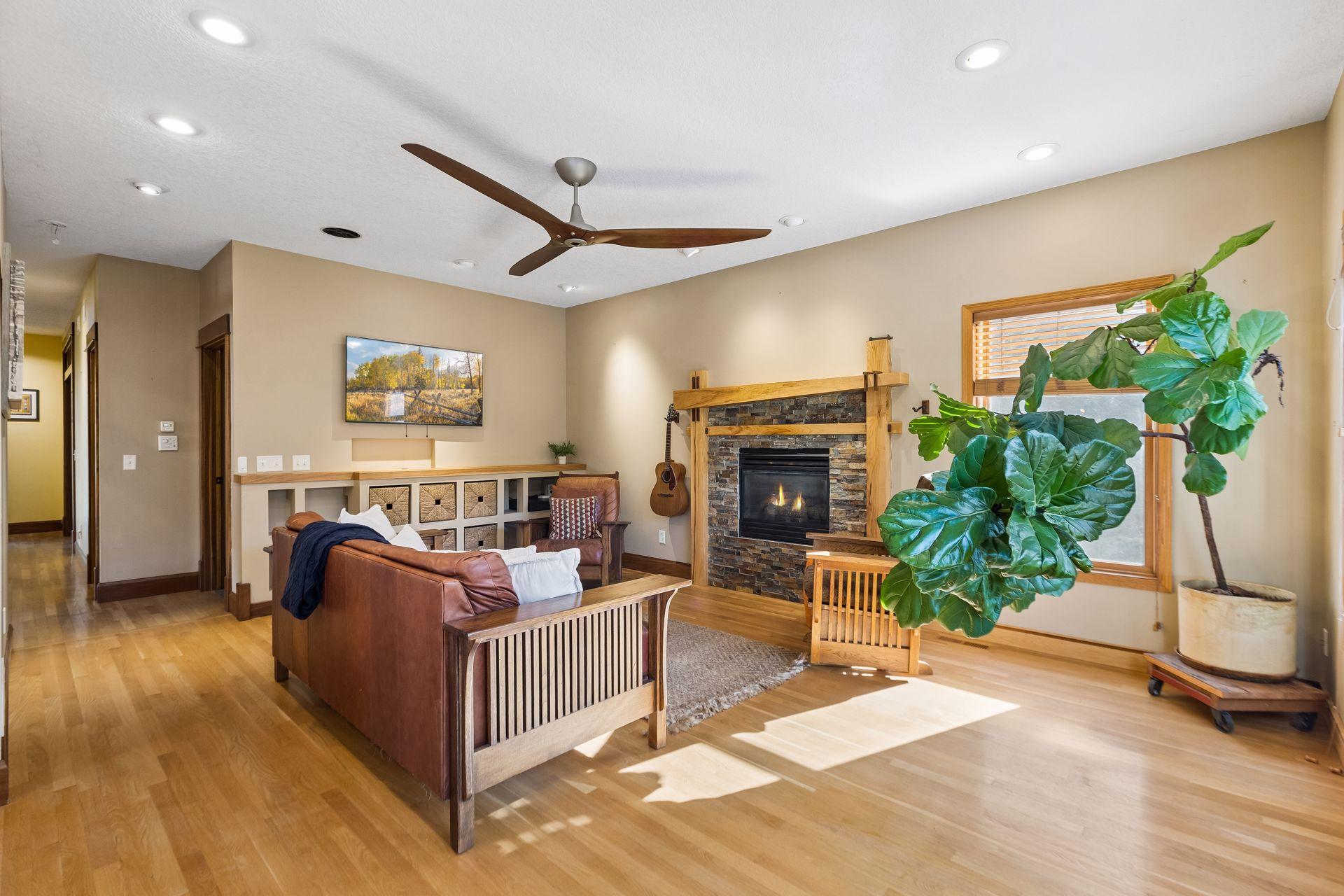 Custom built-in cabinetry beneath the TV adds a luxurious touch while providing attractive and functional storage.