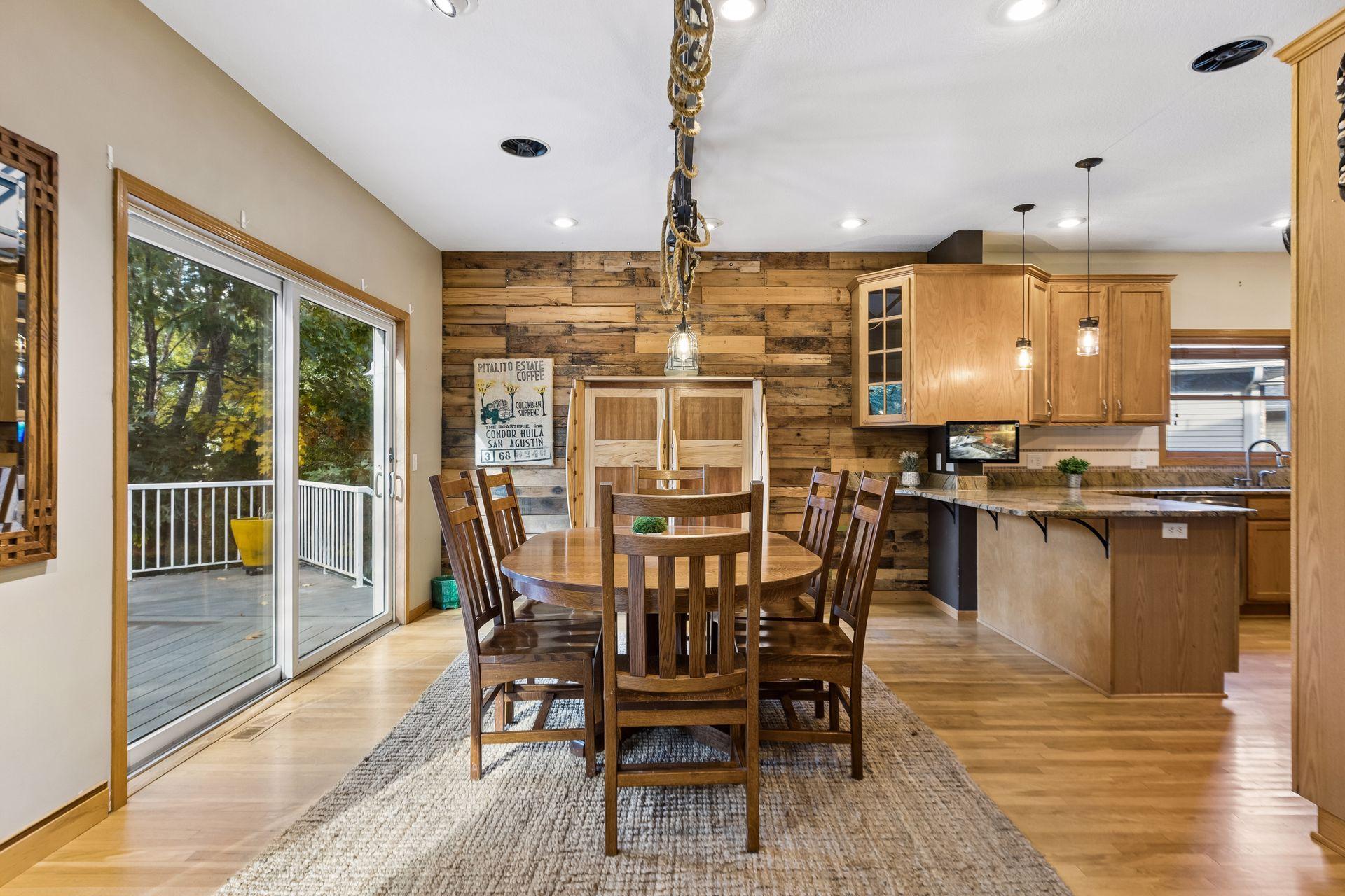 Gorgeous wood shiplap detailing adds warmth, texture, and architectural interest to this thoughtfully designed space.