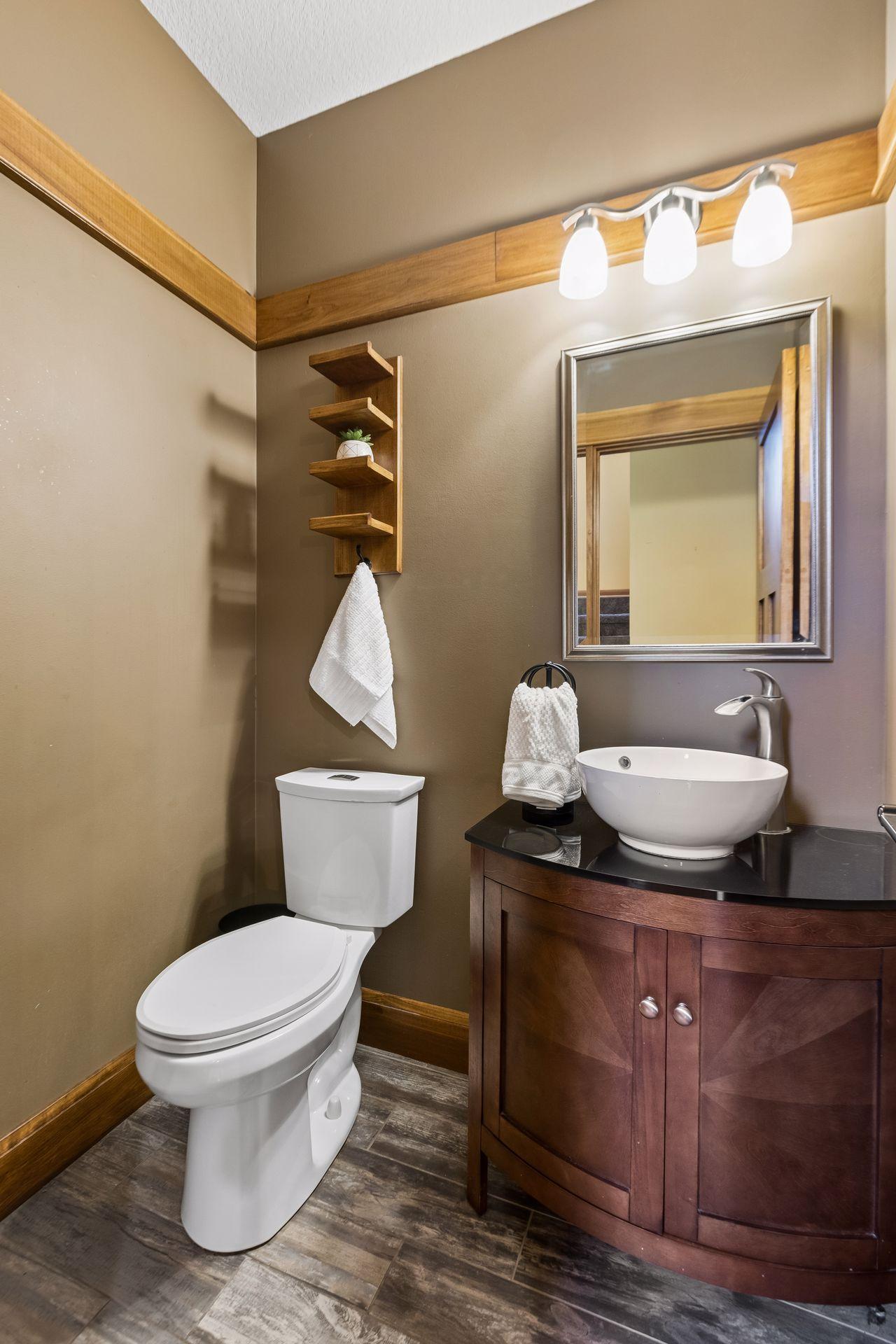 Convenient main-floor powder room, thoughtfully located for guests and everyday use.