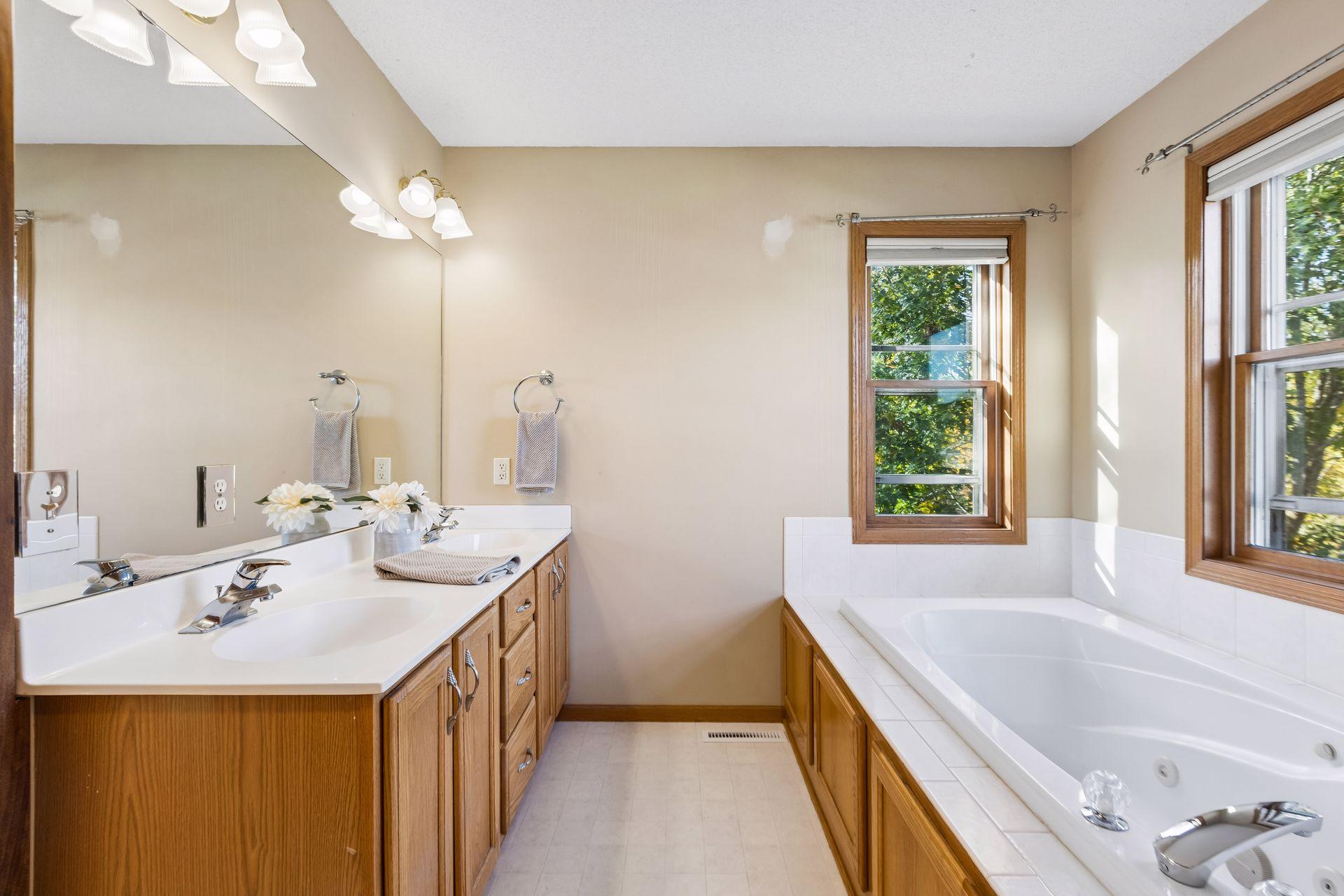 The primary bathroom offers a relaxing retreat with beautiful finishes and a spacious, thoughtfully designed layout.