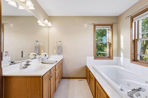 The primary bathroom offers a relaxing retreat with beautiful finishes and a spacious, thoughtfully designed layout.