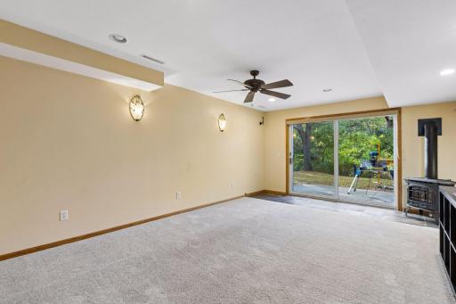 Welcome to the walkout lower level! Abundant natural light and generous living space make this level feel bright and inviting.