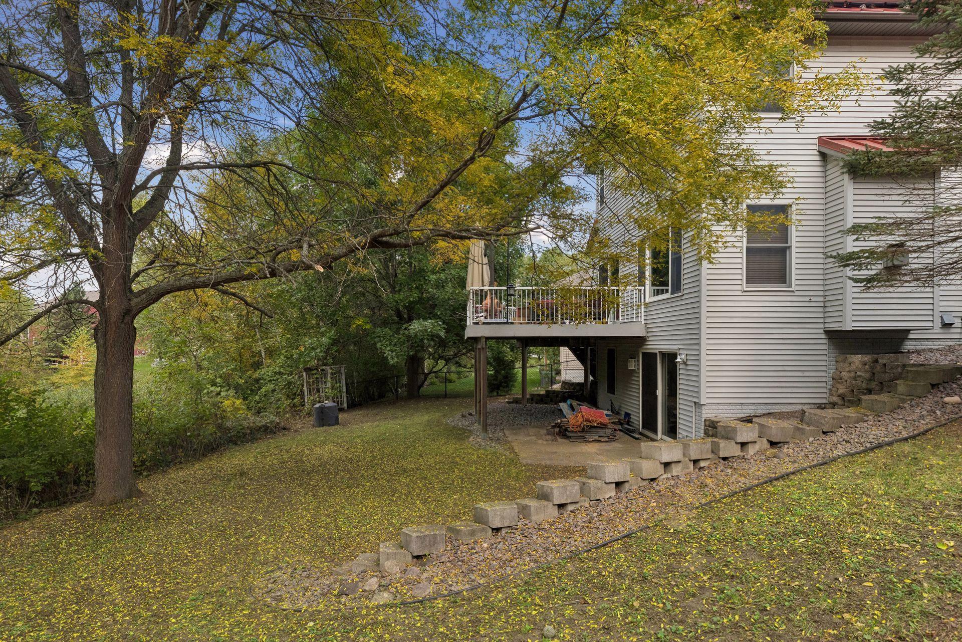 A truly tranquil setting! The expansive backyard and beautiful pond views create the perfect backdrop for outdoor living.